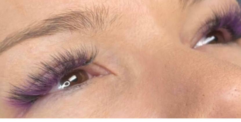 Purple colored eyelash extensions